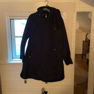 Large Black Cole Haan raincoat. New with Tags.